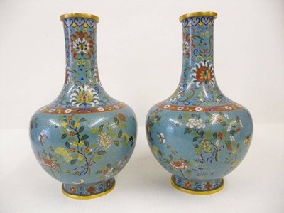 Lot 230 - A Pair of Chinese Cloisonne Vases, late 19th century, of shaft and globe shape, worked with lotuses