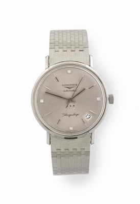 Lot 245 - A Rare 18ct White Gold Automatic Calendar Centre Seconds Wristwatch, signed Longines, Model:...