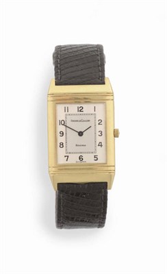 Lot 253 - An 18ct Gold Reverso Wristwatch, signed Jaeger LeCoultre, Model: Reverso, circa 1991, quartz...