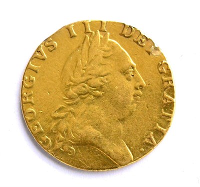 Lot 115 - George III, Guinea 1788, 8.3g, surface marks & scratches & edge milling smooth at 12 o'clock...