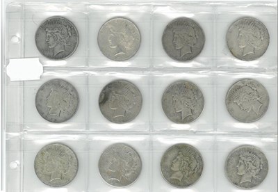 Lot 184 - USA, 12 x 'Peace' Silver Dollars: 1922(x3), 1922D(x3), 1922s, 1923, 1924, 1927, 1934 & 1935,...