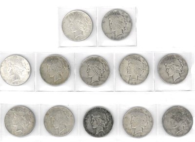 Lot 185 - USA, 12 x 'Peace' Silver Dollars: all 1922, various grades, one About Good, remainder generally...