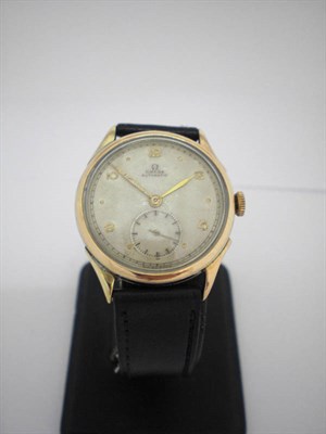 Lot 276 - A Steel and Gold Filled Automatic Wristwatch, signed Omega, circa 1950, 17-jewel lever movement...