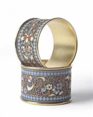 Lot 305 - A Pair of Russian Silver Gilt and Enamel Napkin Rings, probably Pyetr Milukov, Moscow, circa...