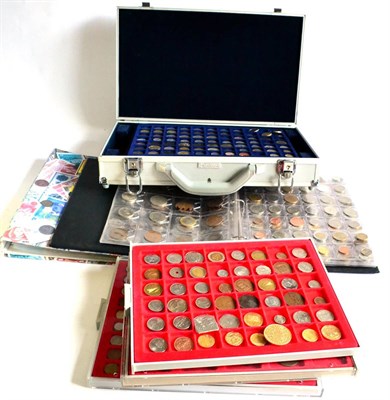 Lot 210 - A Collection of 720+ Foreign Coins, housed in an aluminium case, albums & plastic cabinet...