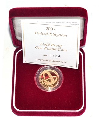 Lot 243 - Gold Proof £1 2007, rev. Gateshead Millennium Bridge, 19.6g, .916 gold, with cert, in CofI, FDC