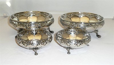 Lot 315 - A Set of Four George V Sweetmeat Dishes, maker's mark H&S, Birmingham 1919 and 1921, circular, with