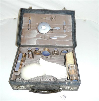 Lot 323 - A George V Silver and Enamel Mounted Dressing Table Set in Leather Vanity Case, Levi & Salaman,...