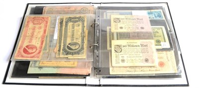 Lot 398 - An Album Containing 300+ Foreign Banknotes, about 50% Russian (1909-1938) including 50 x 10 roubles