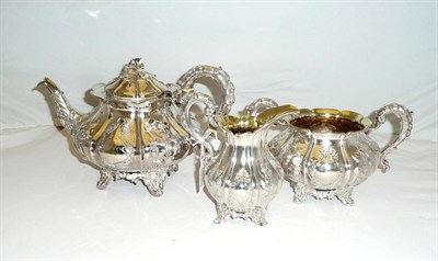 Lot 351 - A Victorian Three Piece Teaset, maker's mark IW, London 1839, of lobed baluster form with an...