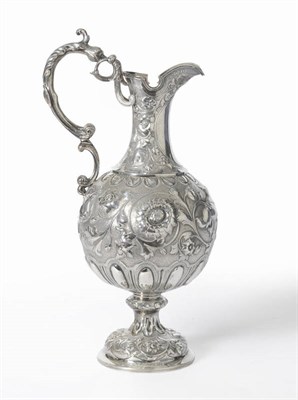 Lot 352 - A Victorian Claret Jug, Turner Simpson, London 1866, the domed circular foot rising to a...