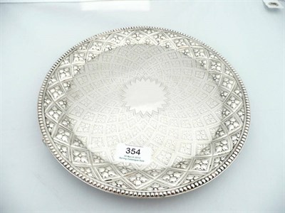 Lot 354 - A Victorian Salver, Robert Hennell, London 1865, circular, with a chased and engraved field of...