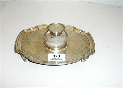 Lot 373 - A George III Irish Teapot Stand, Law & Bayly, Dublin 1796, the shaped oval stand later applied with