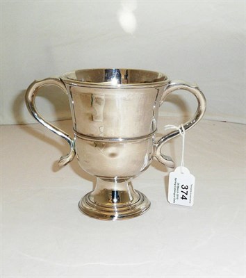 Lot 374 - A George III Cup, John Langlands, Newcastle 1774, the plain girdled circular body with twin...