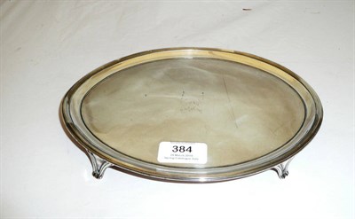 Lot 384 - A George III Waiter, Elizabeth Jones, London 1791, plain oval with reeded rim and four bracket...