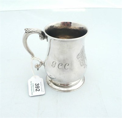 Lot 392 - A George II Mug, probably William & Robert Peaston, London 1748, of typical plain baluster form...