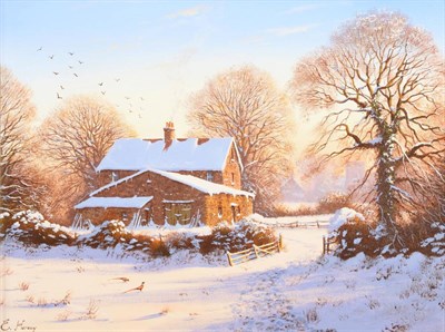 Lot 2109 - Edward Hersey (b.1948) A farmstead before a church in a snow covered landscape Signed, oil on...