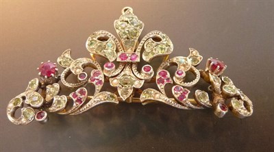 Lot 440 - A Peridot, Ruby and Seed Pearl Coronet Brooch, a central detachable fleur-de-lys motif with...