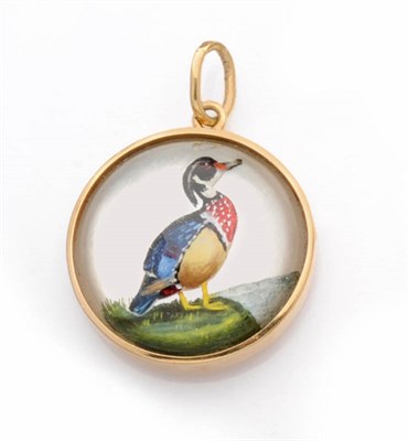 Lot 449 - An Essex Crystal Pendant, of circular domed form, depicting a wood duck, measures 2.6cm by 3.7cm