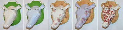 Lot 2170 - British School (Contemporary) Floral cow head Ceramic mounted on a wooden plaque, together with...