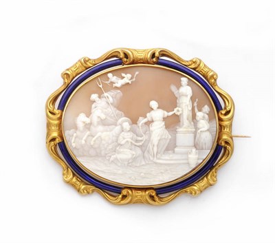 Lot 452 - A Large Oval Cameo Brooch, carved with a classical scene depicting Apollo in a horse drawn chariot