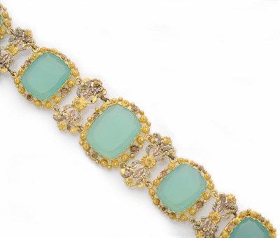 Lot 455 - A Green Chalcedony Bracelet, five green chalcedony stones set within filigree mounts in three...