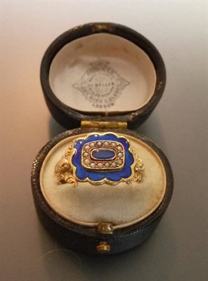 Lot 456 - A Seed Pearl and Enamel Memorial Ring, a blue enamelled lozenge within a border of seed pearls sits