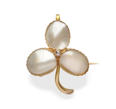 Lot 462 - A Diamond and Mabe Pearl Trefoil Brooch, the oval mabe pearls in fluted edge settings are...