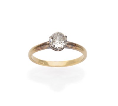 Lot 465 - A Diamond Solitaire Ring, the old cut diamond in a six white claw setting on a yellow tapered...