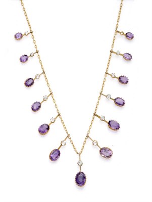 Lot 477 - An Amethyst Fringe Necklace, the graduated drops each comprise a knife edge bar, a very pale...