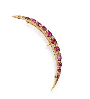 Lot 480 - A Victorian Ruby and Diamond Crescent Brooch, graduated oval cut rubies spaced by pairs of rose cut