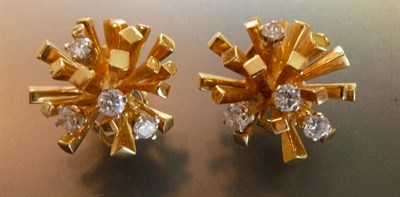 Lot 484 - A Pair of 18 Carat Gold Diamond Set Earrings, protruding squared stems set with four round...