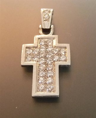 Lot 498 - A Diamond Cross, the chunky flat cross pavé set with round brilliant cut diamonds, 0.75...