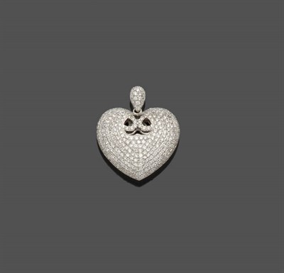 Lot 520 - A Diamond Heart Pendant, with a cut out centre, and pavé set with round brilliant cut diamonds...