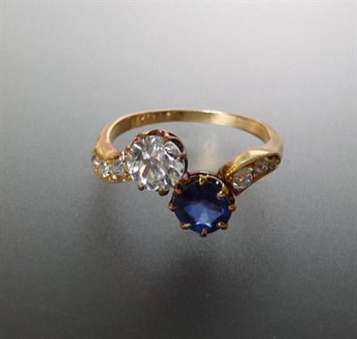 Lot 535 - An 18 Carat Gold Sapphire and Diamond Two Stone Twist Ring, an old brilliant cut diamond and a...