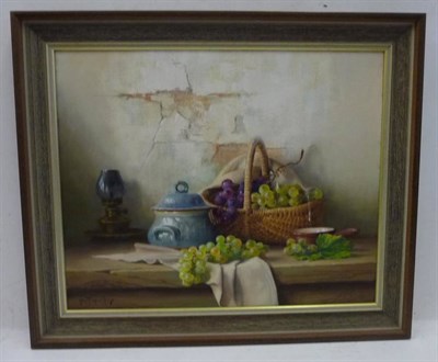 Lot 1256 - Robert Challioux (1913-2006) A still life of grapes in a basket and vessels Signed, oil on...