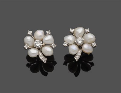 Lot 542 - A Pair of Freshwater Pearl and Diamond Earrings, a round brilliant cut diamond sits within a...