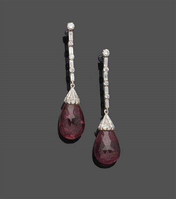 Lot 546 - A Pair of 18 Carat White Gold Pink Tourmaline and Diamond Drop Earrings, a round brilliant cut...