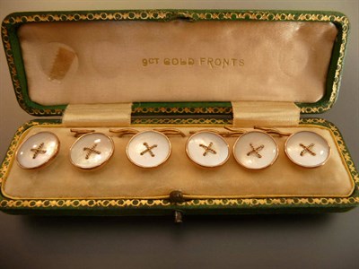 Lot 564 - A Set of Six Mother-of-Pearl Dress Studs, the round mother-of-pearl disks within a rose gold...