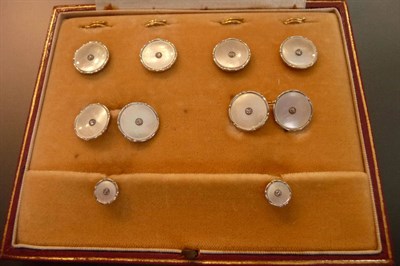 Lot 565 - A Set of Diamond and Mother-of-Pearl Dress Studs, four shirt studs, a pair of chain linked...