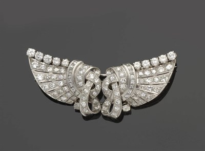 Lot 574 - A Diamond Double Clip Brooch, circa 1920-1930, each half of the brooch in a winged form...