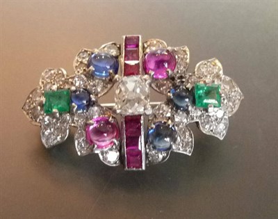 Lot 583 - A Multi Gem Brooch, an old mine cut diamond to the centre, a row of calibré cut rubies to the...