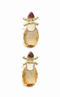 Lot 590 - A Pair of 18 Carat Gold Garnet, Diamond and Citrine Drop Earrings, the rubover set trillion cut...