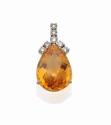 Lot 593 - An 18 Carat White Gold Citrine and Diamond Pendant, the pear shaped rose cut citrine surmounted...