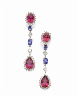 Lot 595 - A Pair of Rubellite, Blue Sapphire and Diamond Drop Earrings, an oval cut rubellite and diamond...