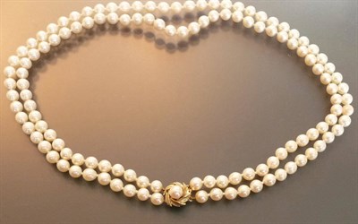 Lot 597 - A Double Strand of Cultured Pearls, the rows of sixty-one and sixty-four cultured pearls are...