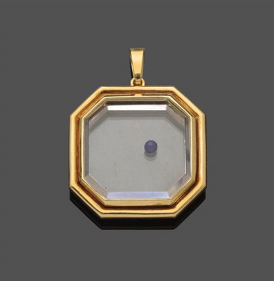 Lot 617 - A Rock Crystal Pendant, by Cartier, the hexagonal two sides of rock crystal contain a spherical...