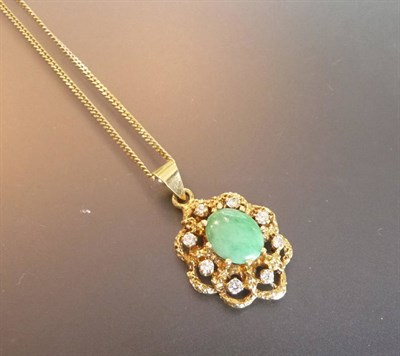 Lot 619 - An 18 Carat Gold Jade and Diamond Pendant on Chain, an oval cabochon jade is claw set within a...