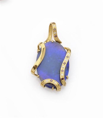 Lot 628 - An 18 Carat Gold Black Opal, Diamond and Amethyst Pendant, the oval cabochon black opal within...