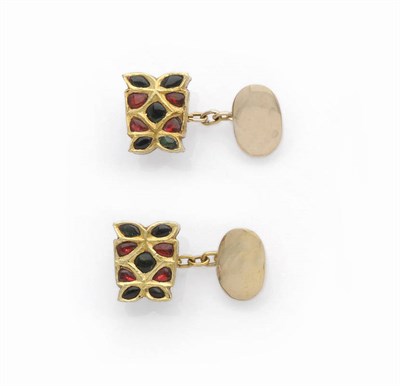 Lot 629 - A Pair of Cufflinks, in the Kundan style, each panel with red and green foil backed stones...